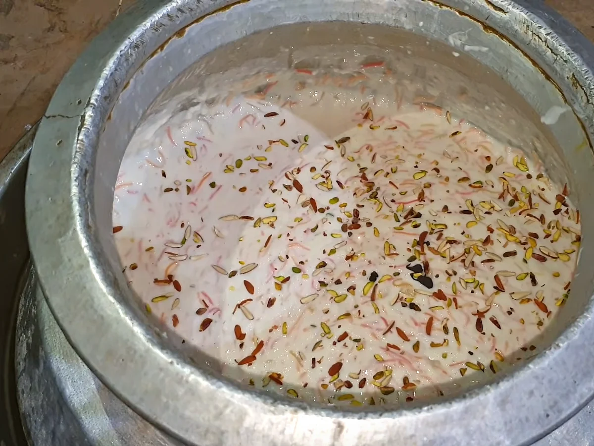 Almonds and pistachios scattered over doodh dulari