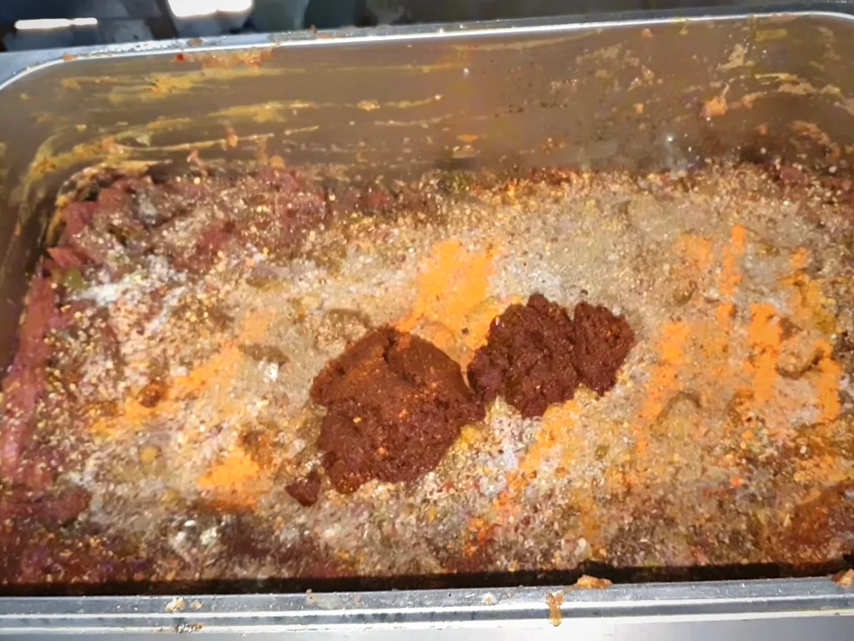 Tikka masala paste added over the spiced beef