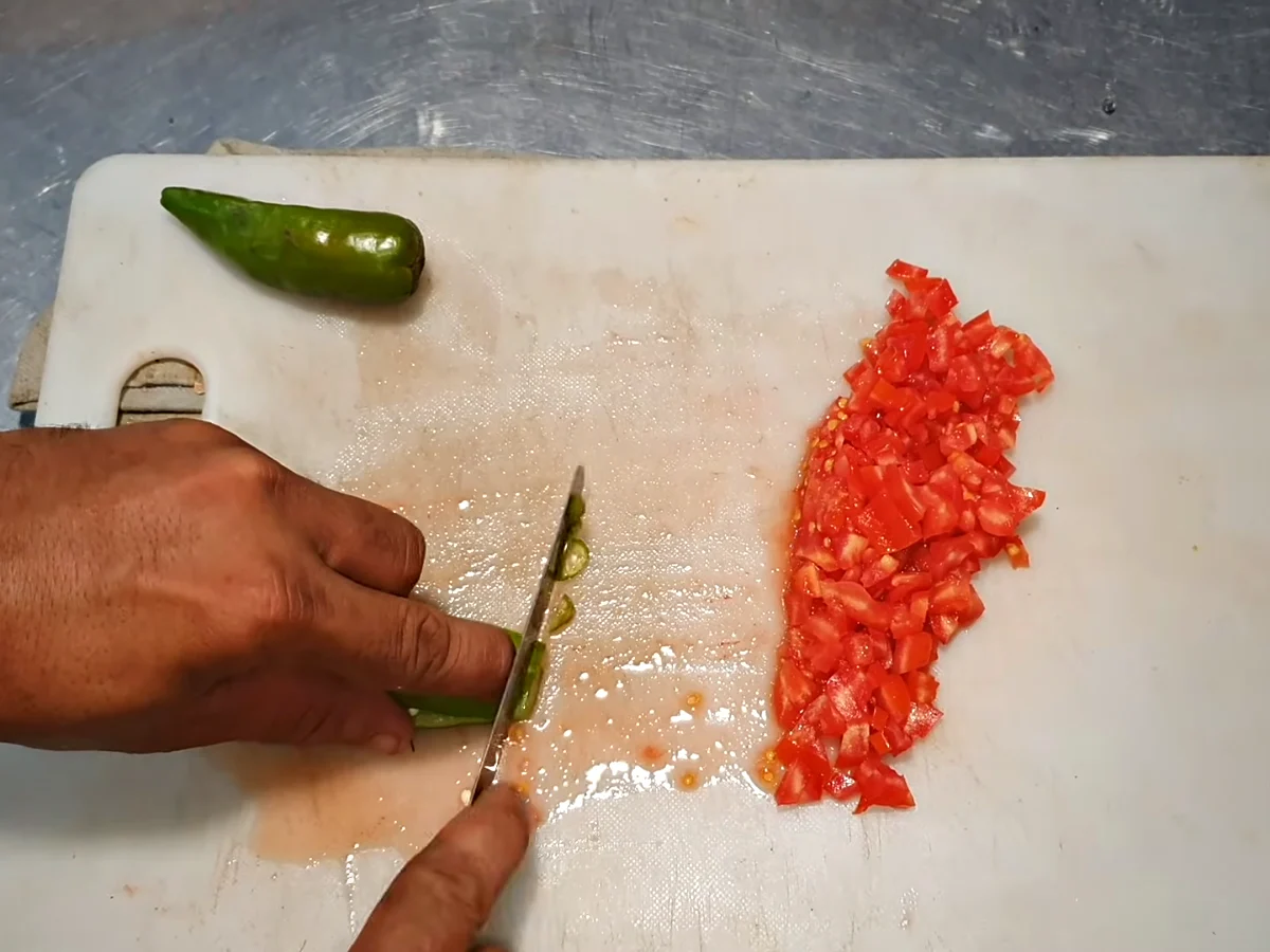 Finely chopped tomato and green chilli for chapli kabab