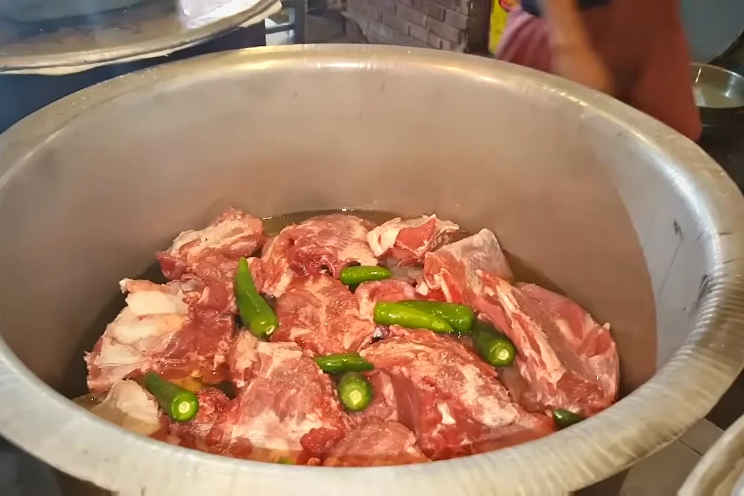Whole green chillies on mutton for rosh