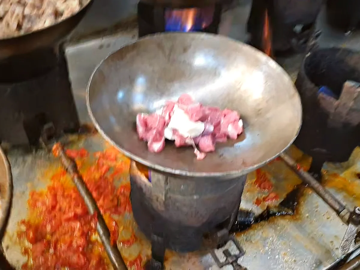 Half kg mutton with oil and salt in a handi