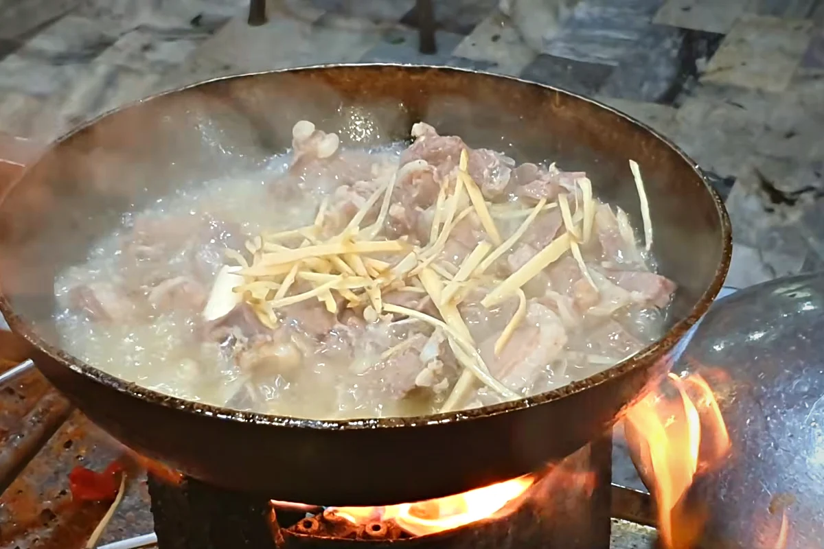 A generous amount of julienne ginger added to mutton karahi