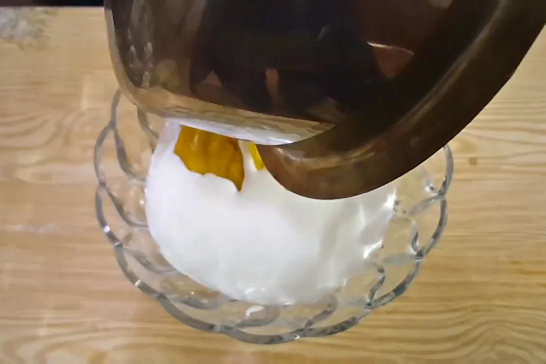Mango puree added to the cream mixture for ice cream