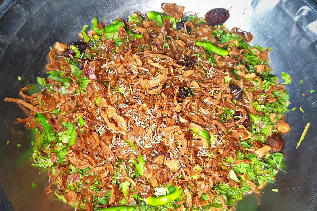 Chopped mint, coriander, green chillies, dried plums and fried onion mixed for biryani layering