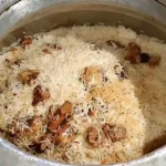 Degi white beef biryani with tender beef pieces and dried plums, Karachi style