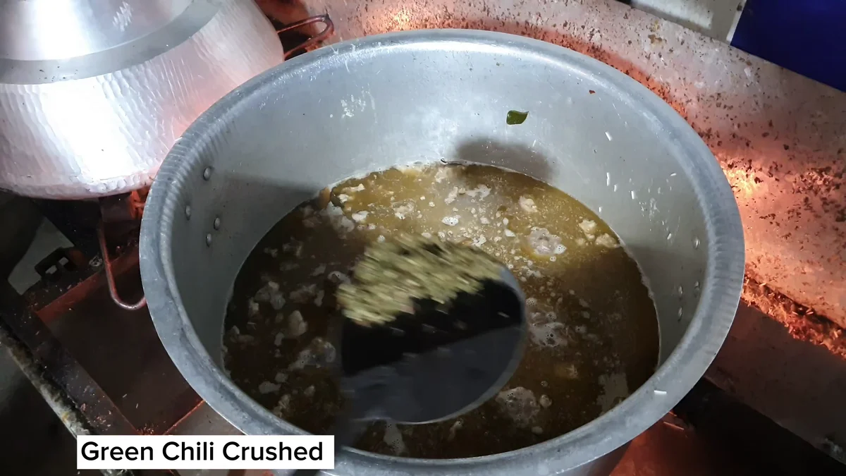 Crushed green chilli added at the rice stage