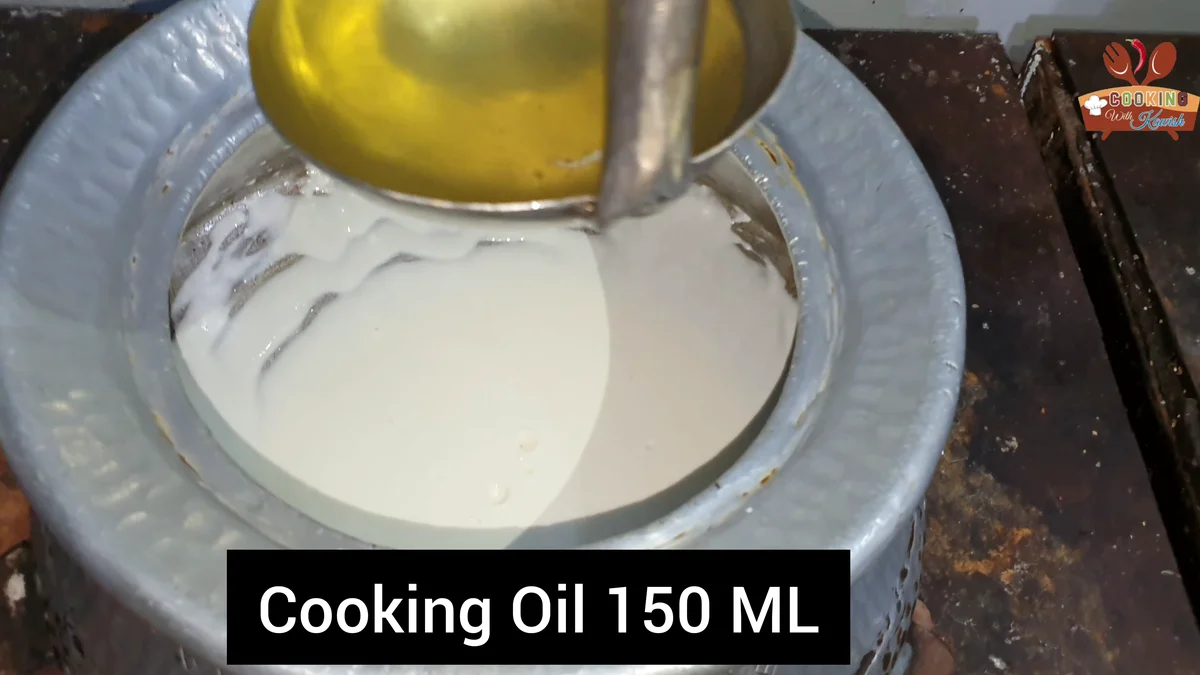 Cooking oil, 150 ml, poured into the whisked yogurt