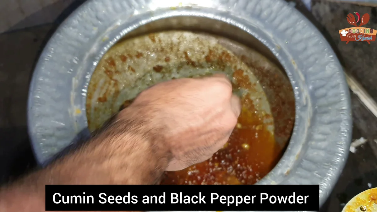 Cumin seeds and black pepper powder being added at the end