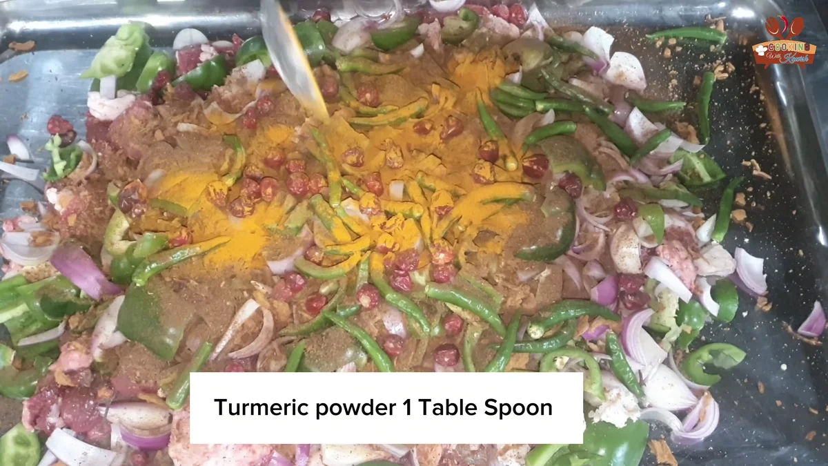 Turmeric powder added over the seekh kabab mixture