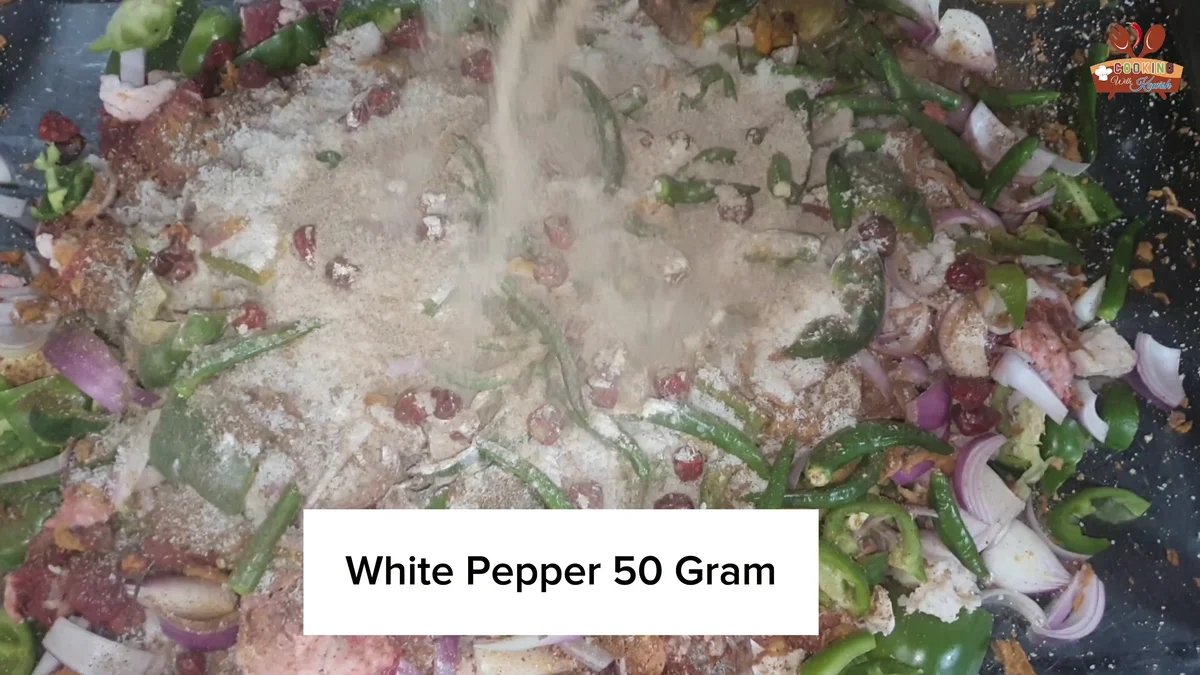White pepper sprinkled over the beef mixture