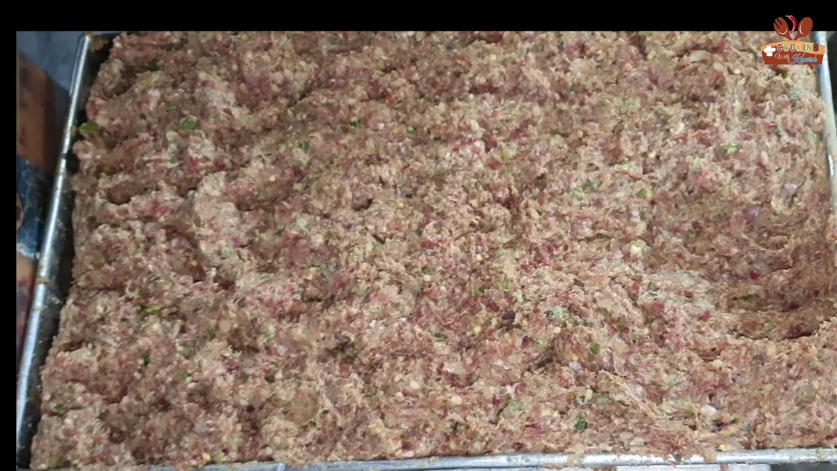 Minced seekh kabab mixture in a large tray