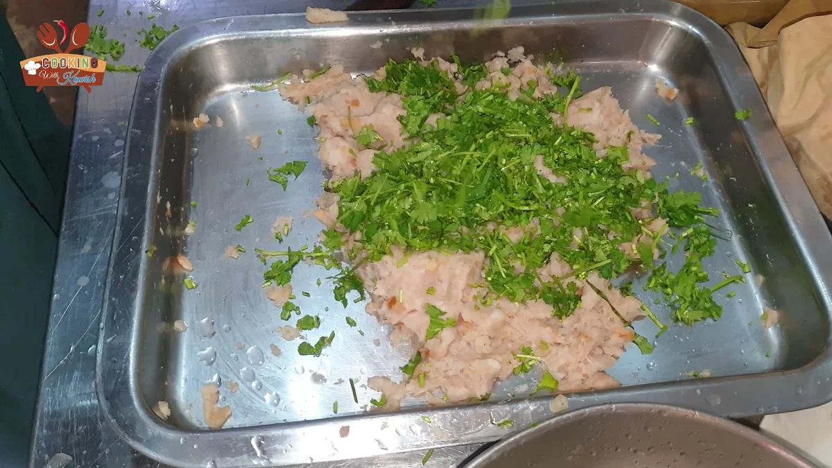 Fresh chopped coriander added to the chicken mince