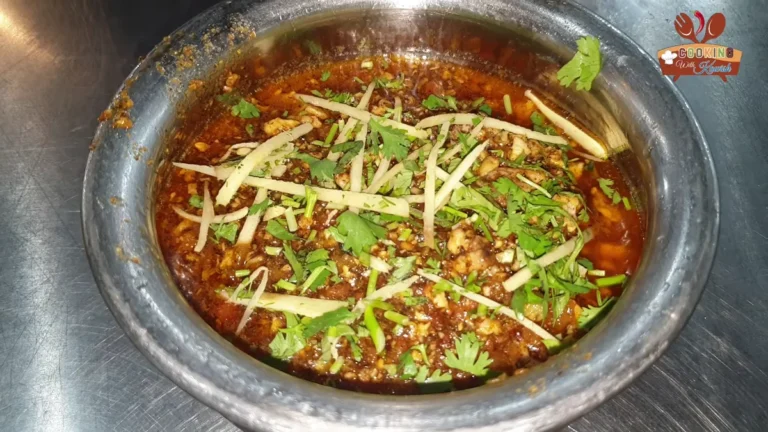 Brain masala in a steel bowl with ginger and coriander