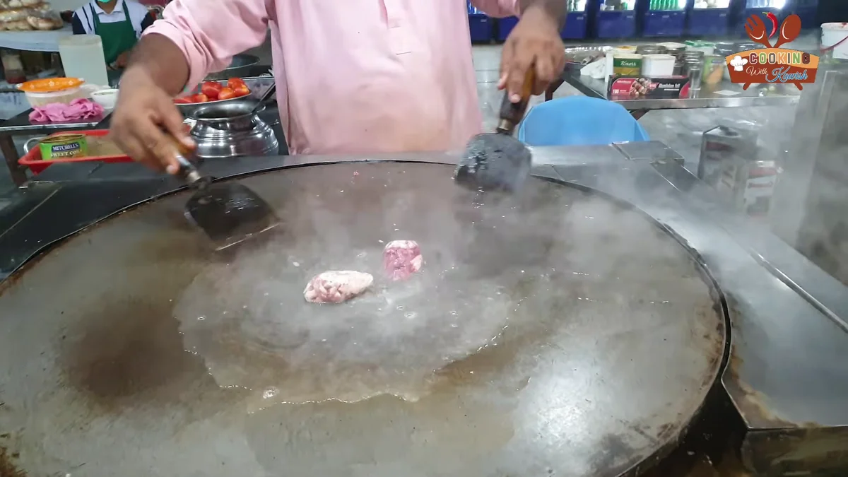 Brain pieces placed on the hot tawa