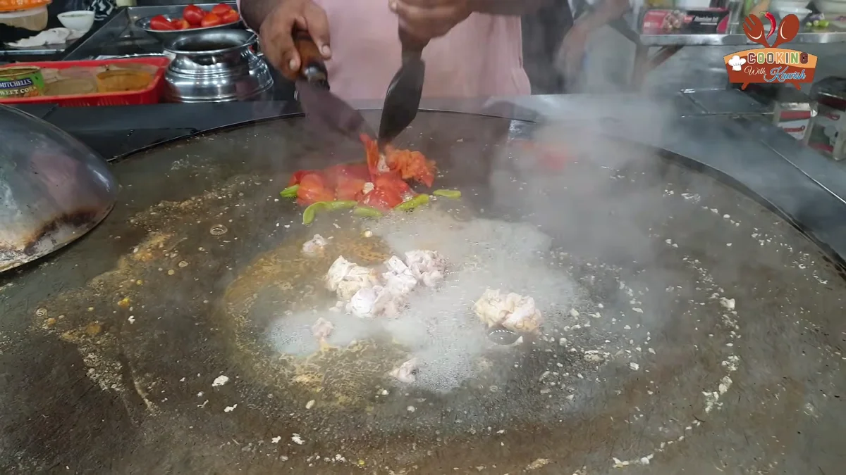 Brain and tomatoes cooking under steam