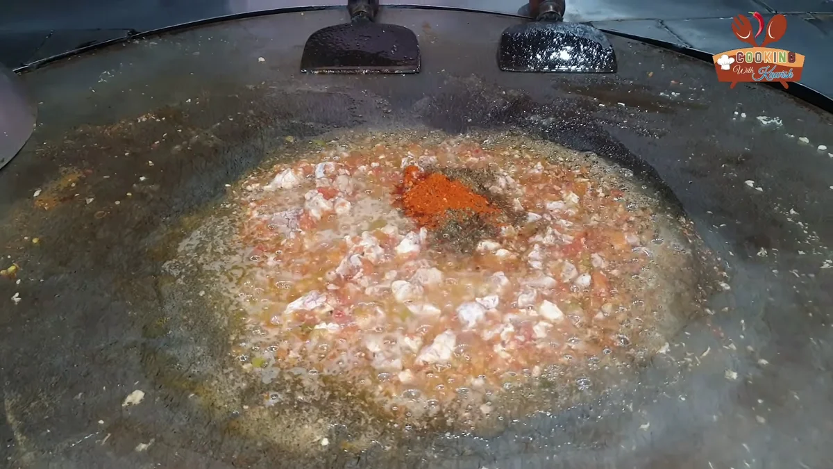 Red spice powder sprinkled over the brain masala