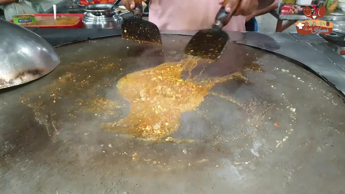Thick brain masala cooking in its own oil