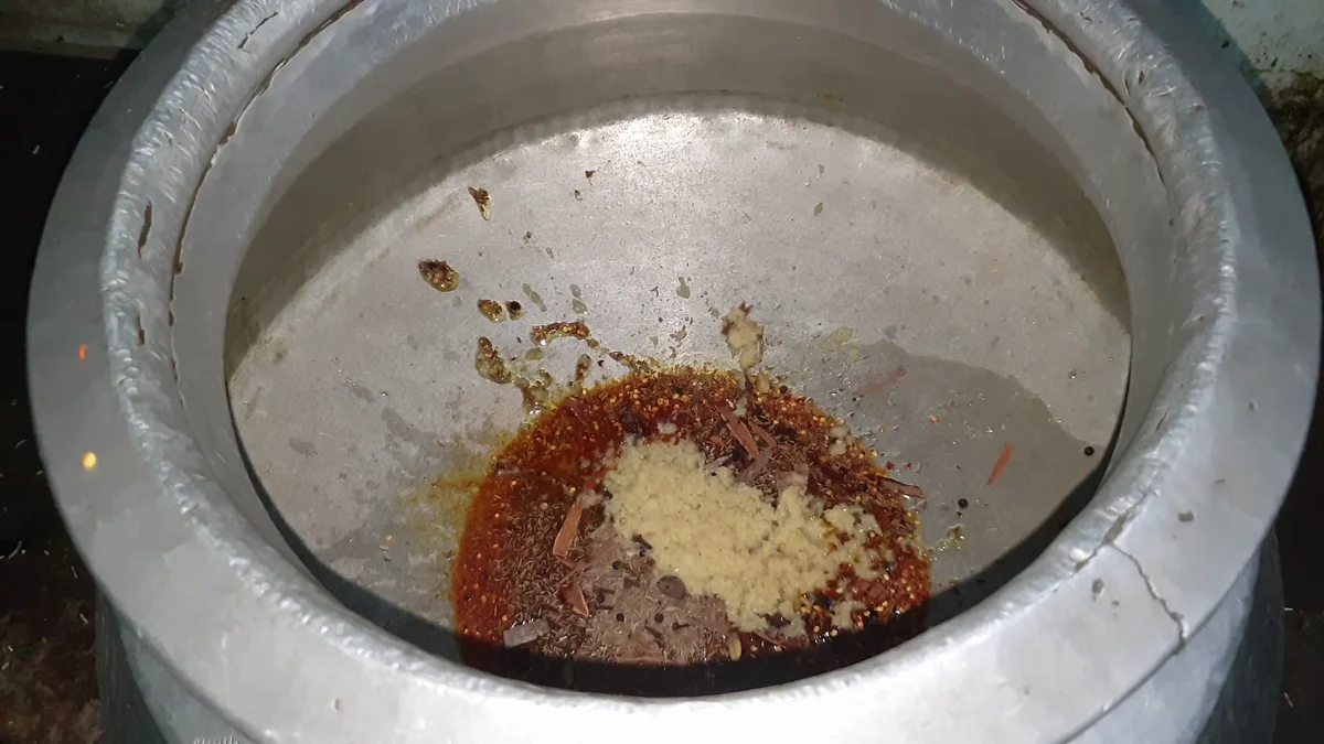 Ginger garlic paste added to the spice masala