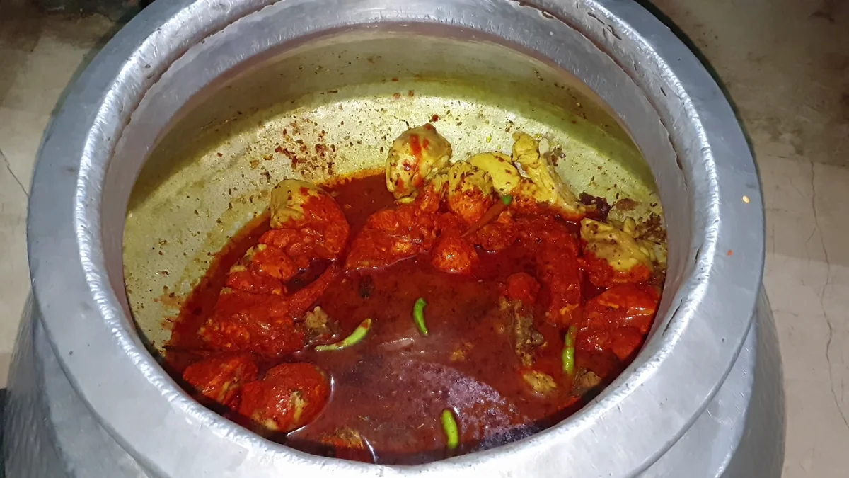 Tomatoes layered over the chicken