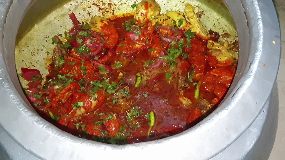 Coriander and mint spread over the tomatoes