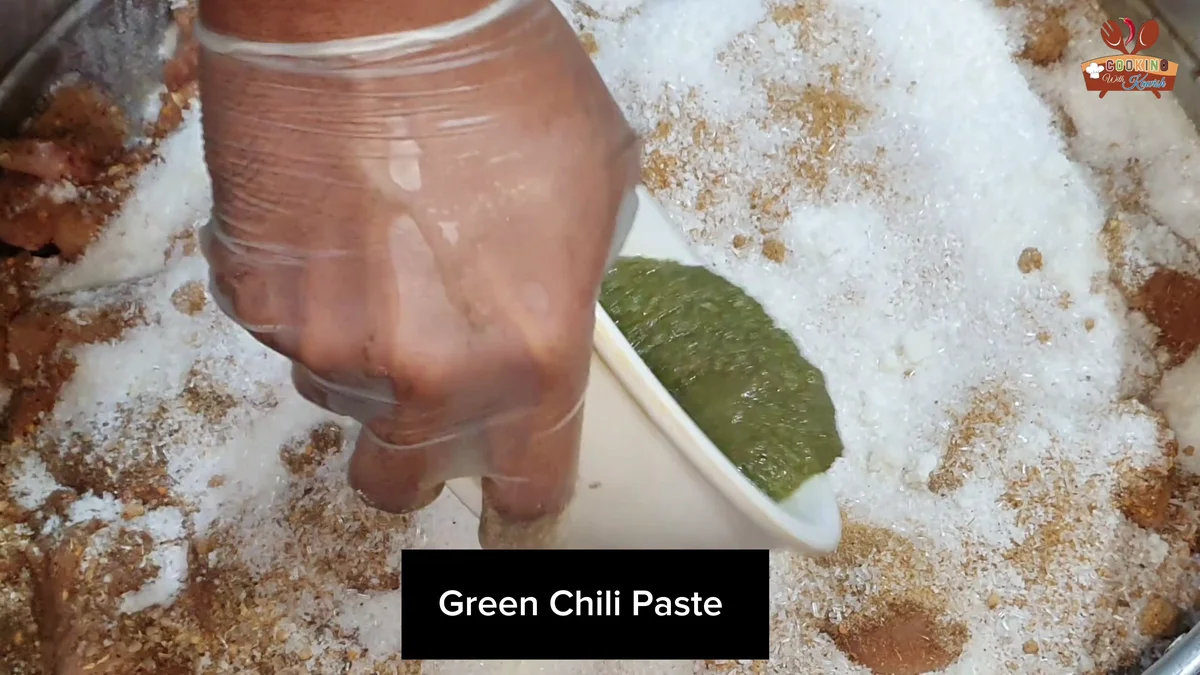 Green chilli paste added to the malai boti marinade