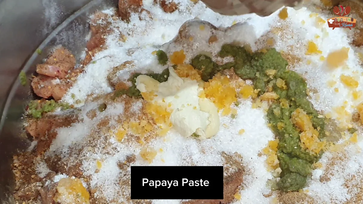 Raw papaya paste and pastes spread over the chicken