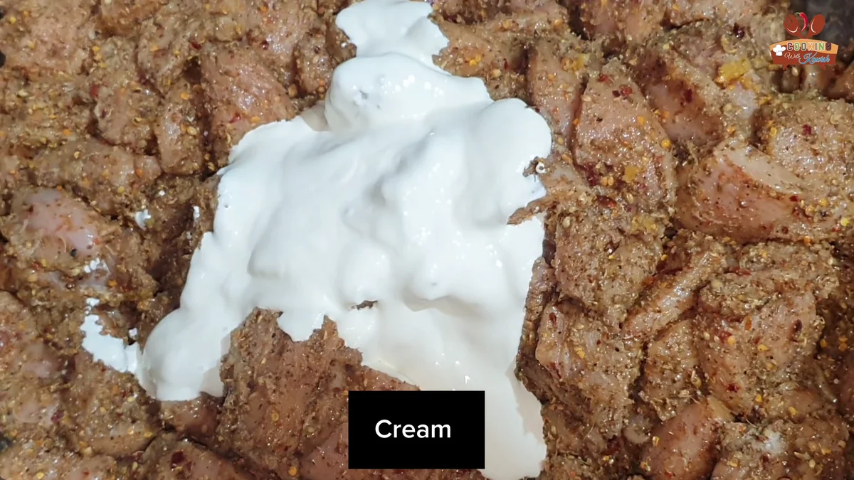 Thick fresh cream on the chicken before mixing