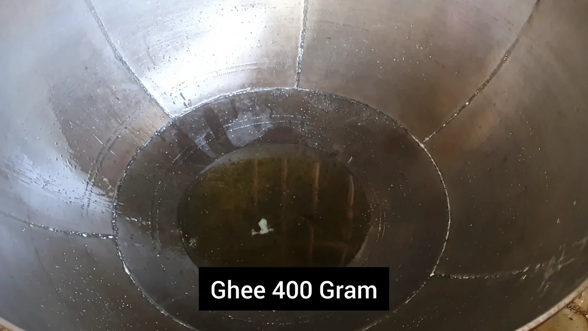 Ghee heating in a large commercial wok