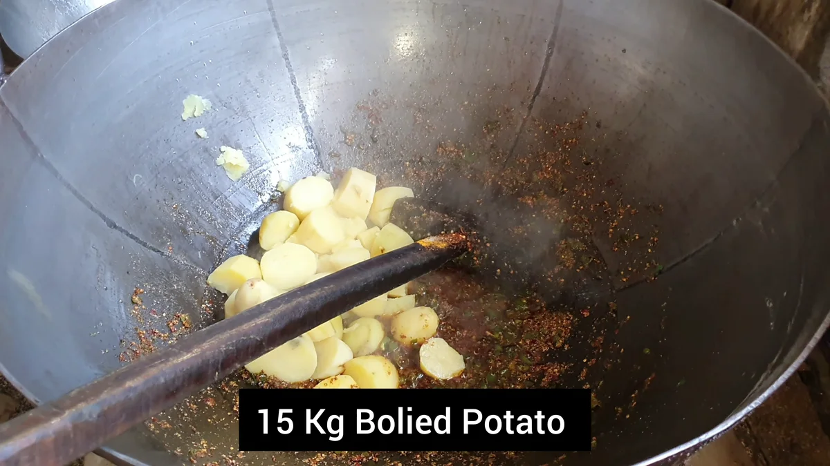Boiled potatoes added to the spice base