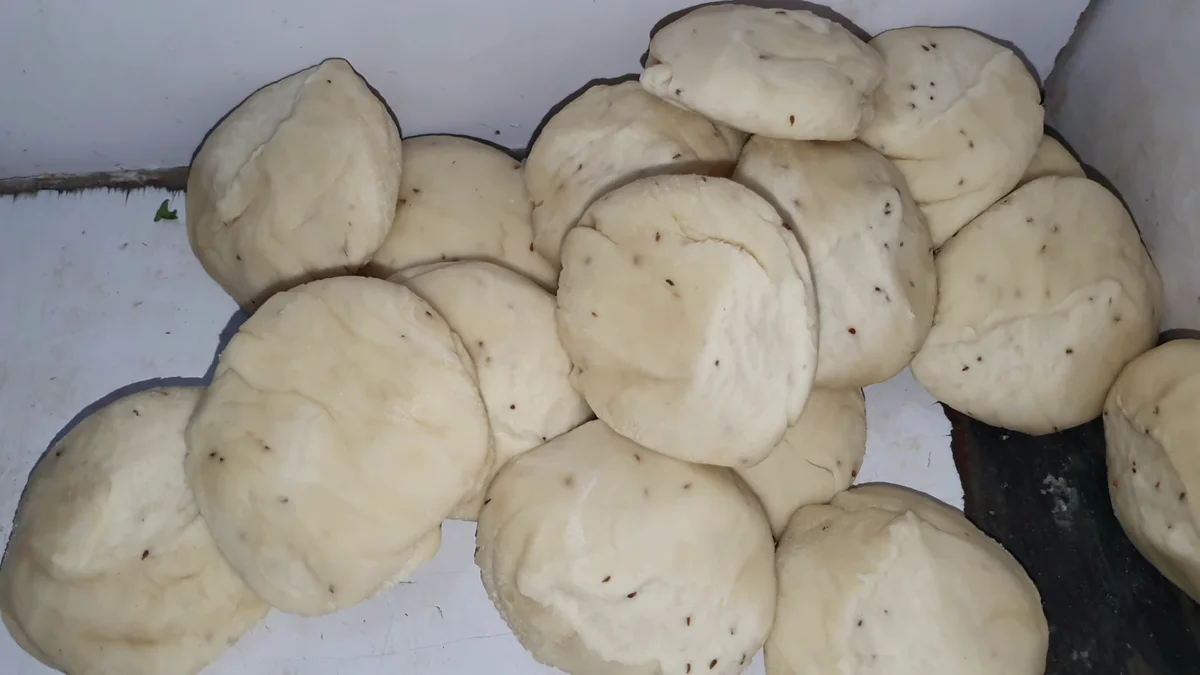 Small dough balls ready to be rolled