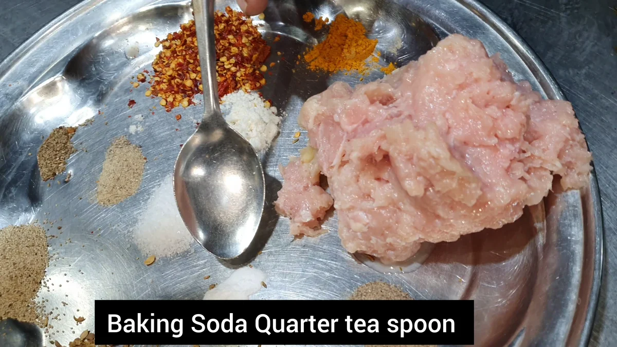 Baking soda added to the chicken mince