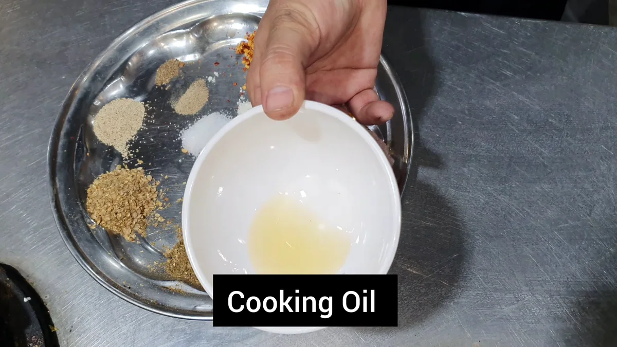 Cooking oil in a small bowl for the mixture