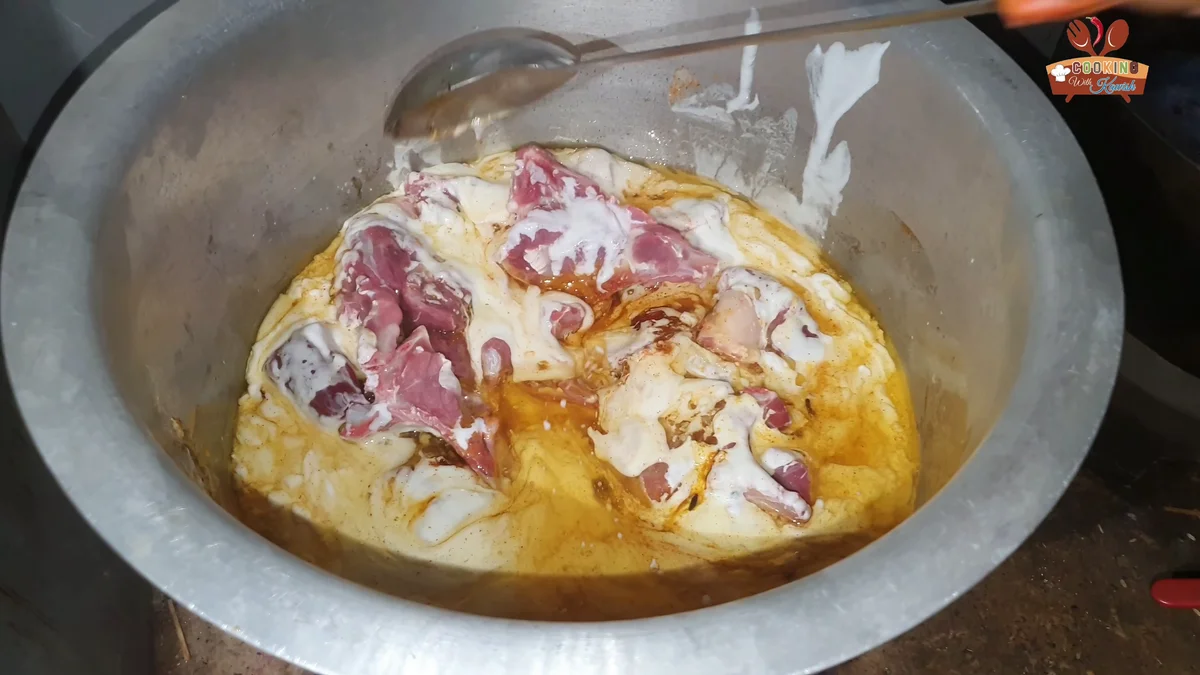 Mutton mixed with the yogurt, oil and spices
