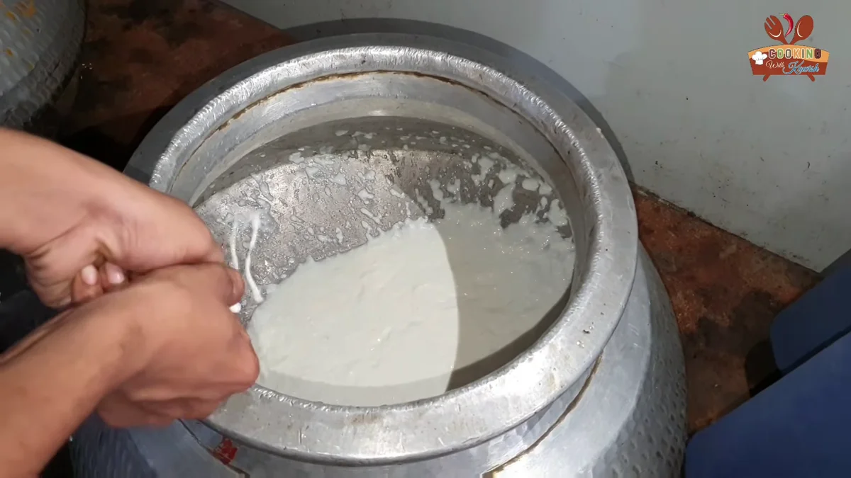 Yogurt whisked by hand in a large deg