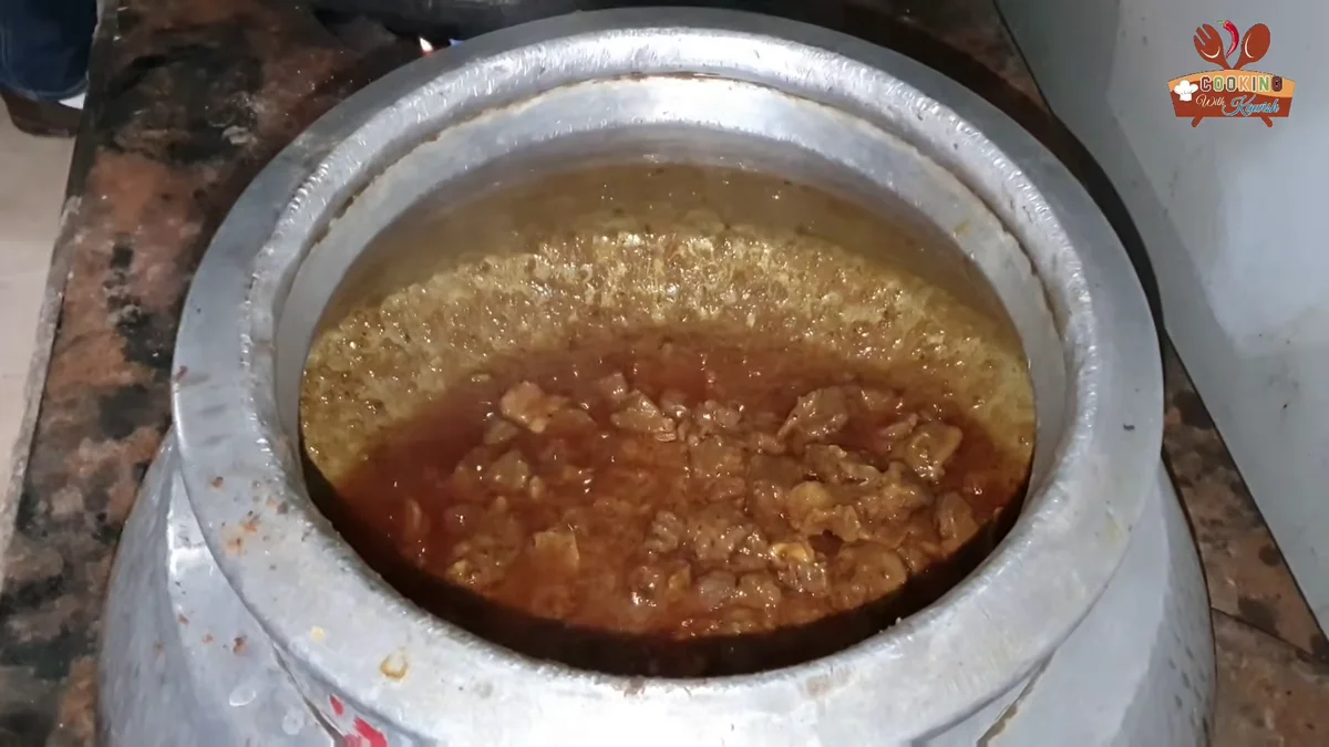 Beef korma gravy darkening as it cooks