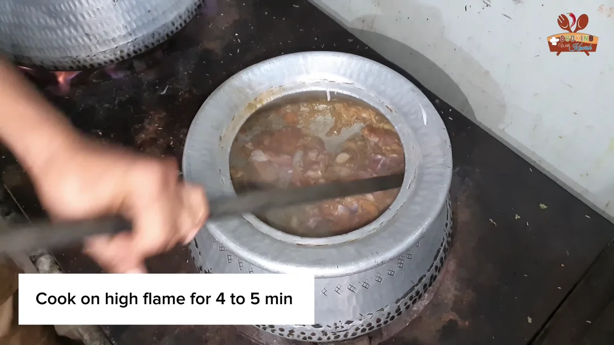 Mutton cooking on high flame in the deg