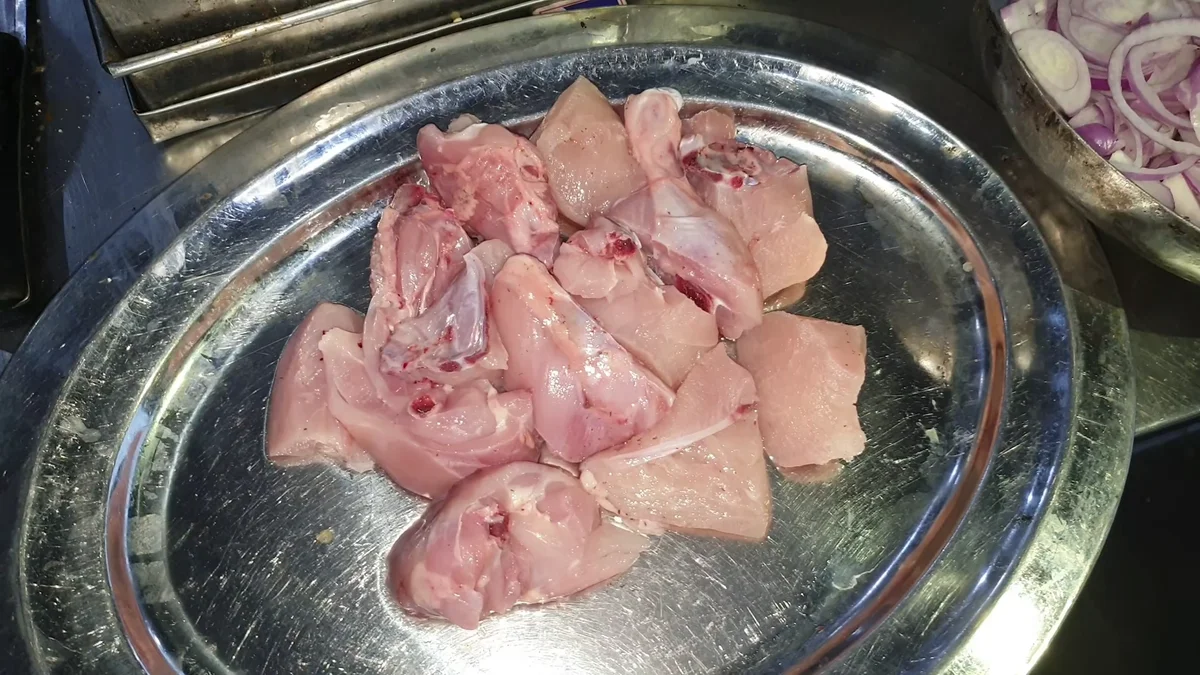 Chicken pieces on a tray