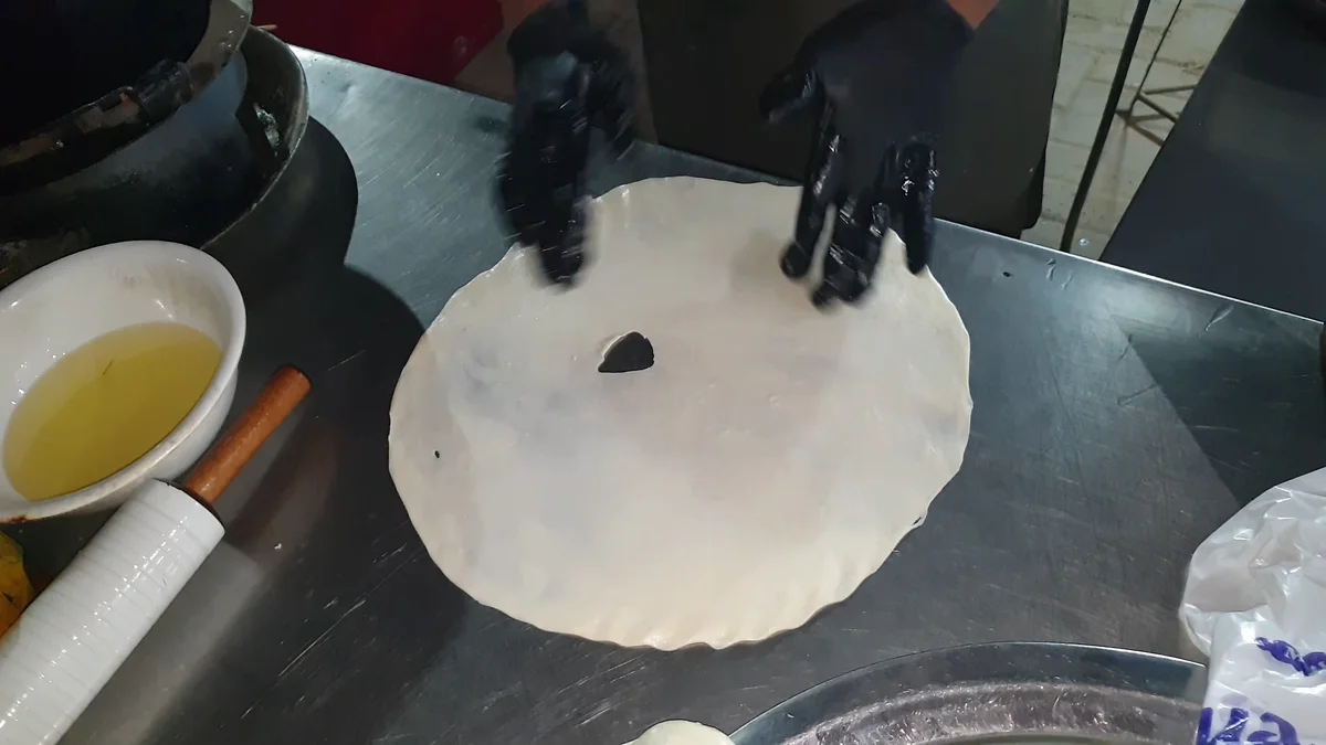 Rolled poori paratha brushed with ghee