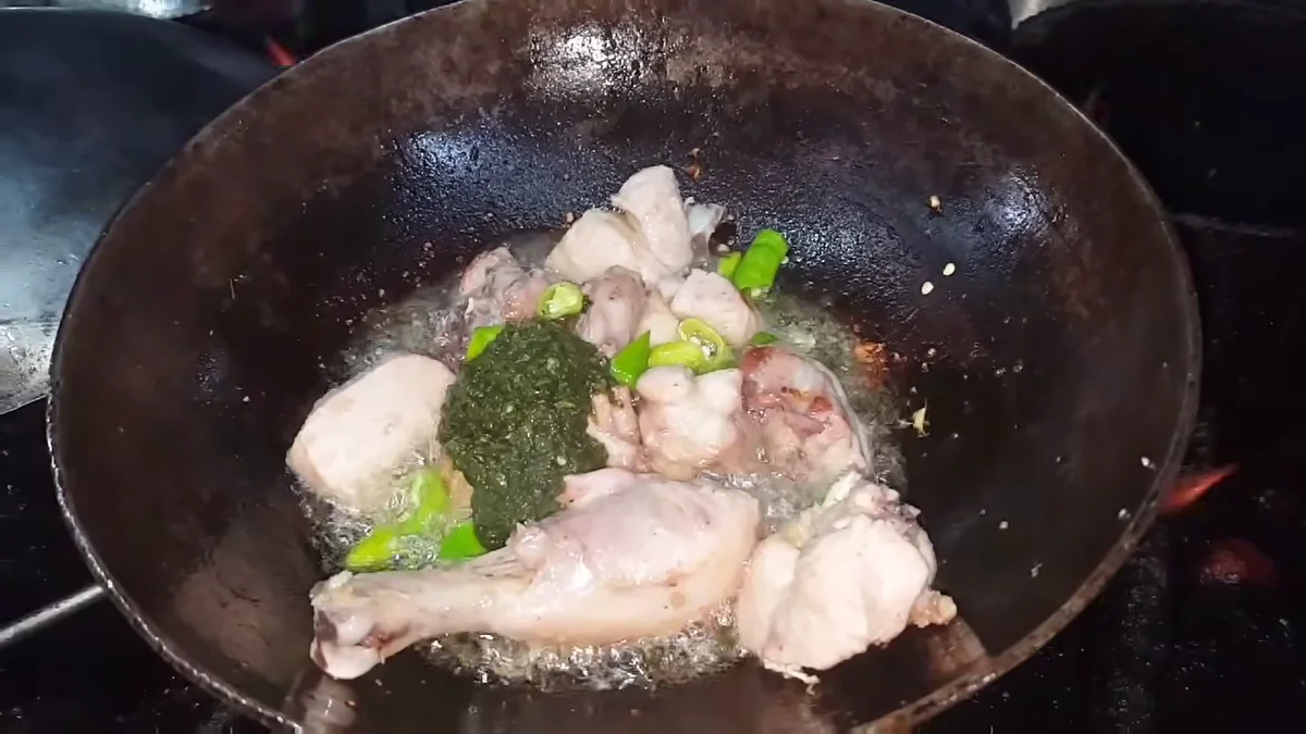 Fresh coriander and mint paste added to the chicken