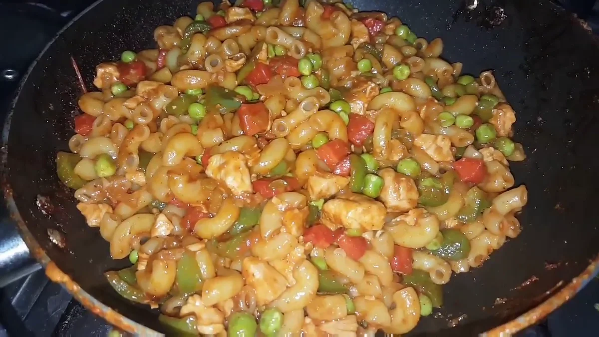 Finished chicken macaroni with vegetables in a pan