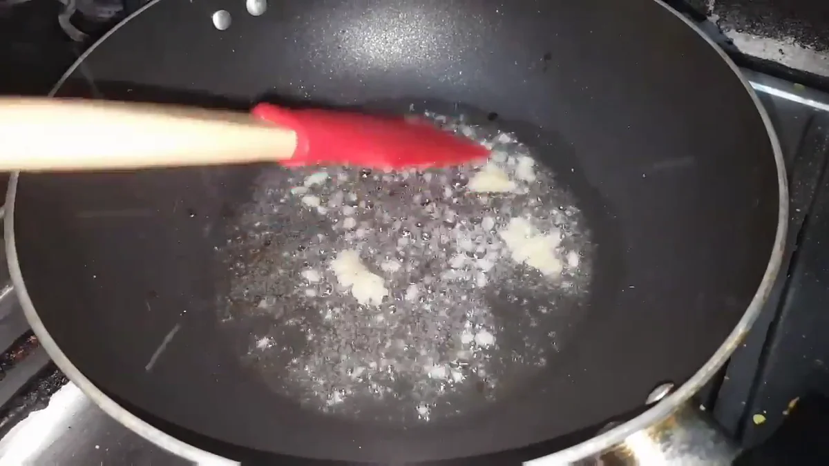 Ginger and garlic paste frying in oil in a pan