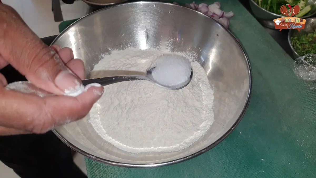 Salt being added to the dry flour mix