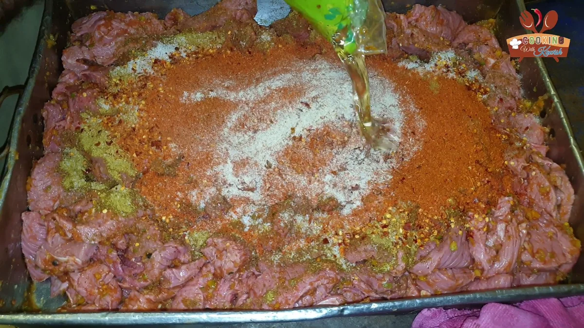 Last spices and oil added to the beef marinade
