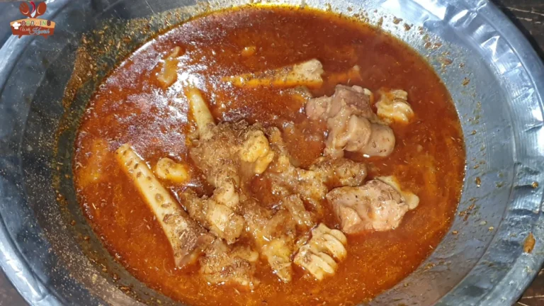 Karachi mutton kunna paya with paya pieces in a red gravy
