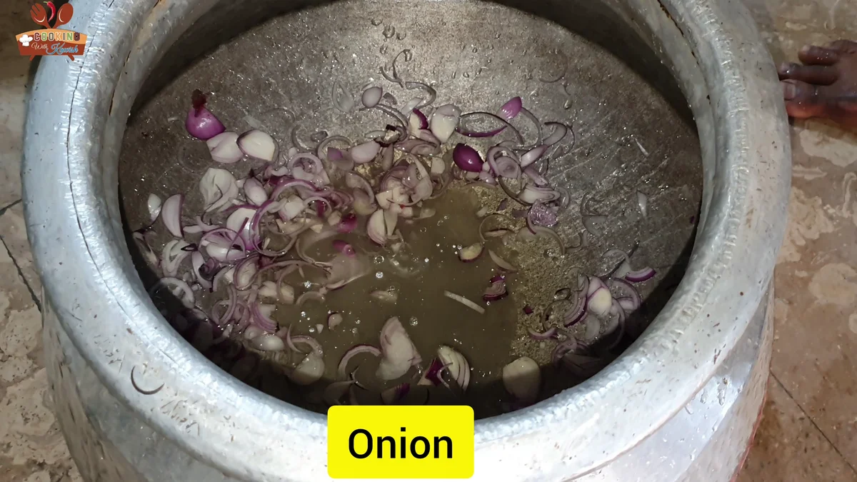 Sliced onions added to the pot