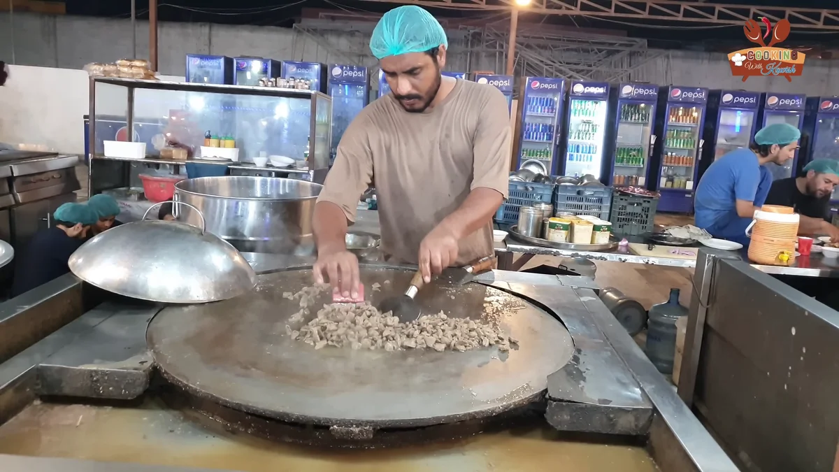 Liver cubes frying on high heat with the first spices