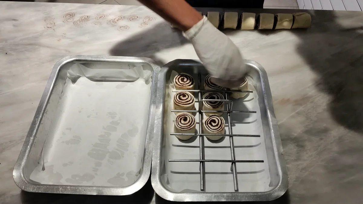 Mini rolls placed on a lined tray