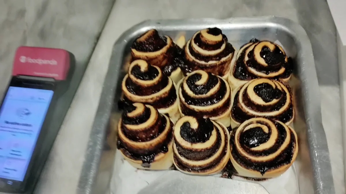 Baked mini cinnamon rolls on the tray