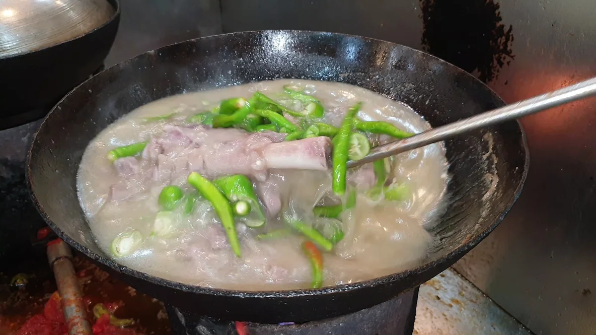 Green chillies added to the mutton karahi