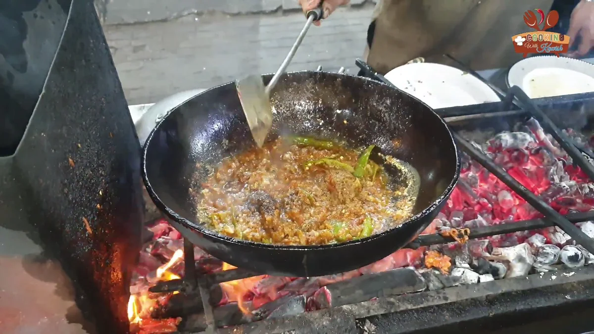 Fish karahi with thick gravy and green chillies